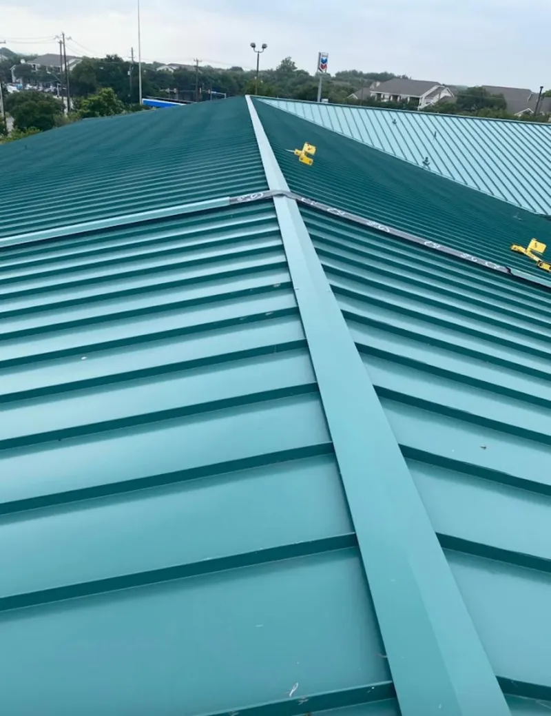 Green commercial metal roof ridge and valley for Metal Roof Repair in Stanwood