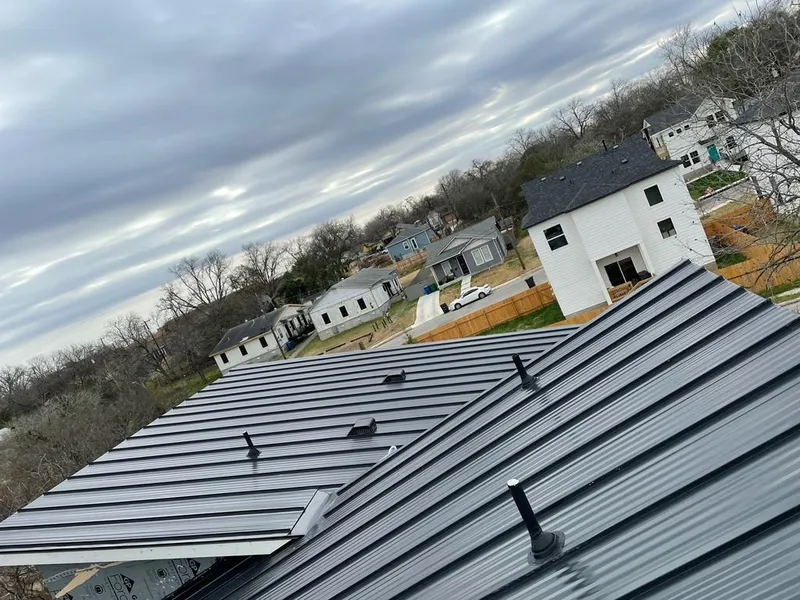 Standing seam metal roof panels with vents for Skylight Repair in Stanwood